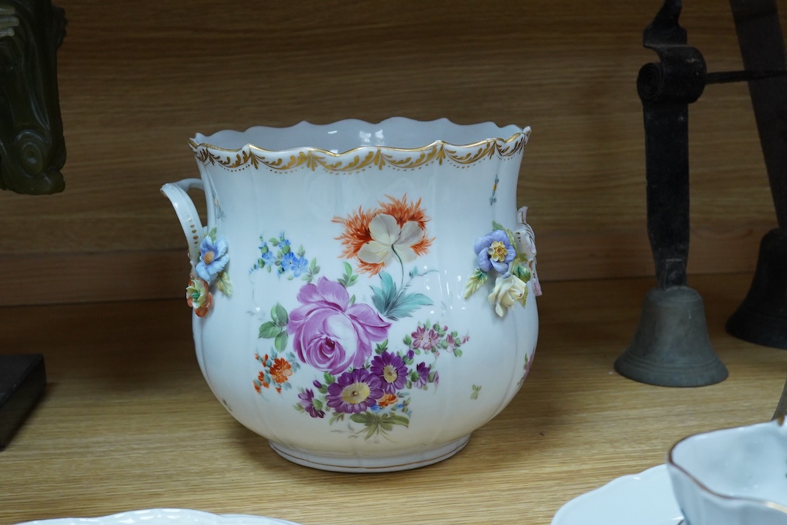 A collection of Meissen porcelain to include floral side plates and a German floral encrusted pot, 18cm high